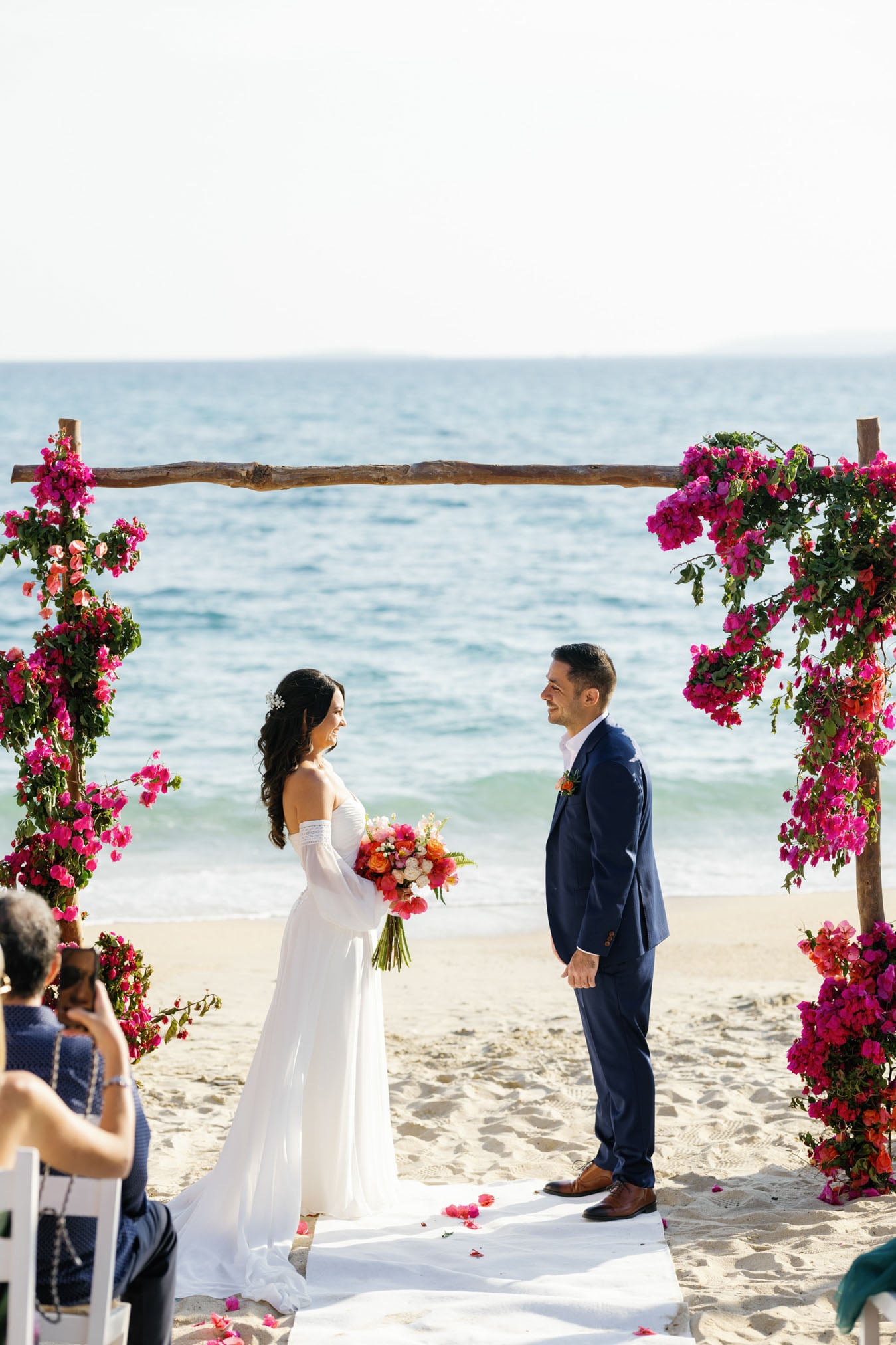 Beach wedding ceremony with floral arch at Agia Anna, Santana Weddings Naxos